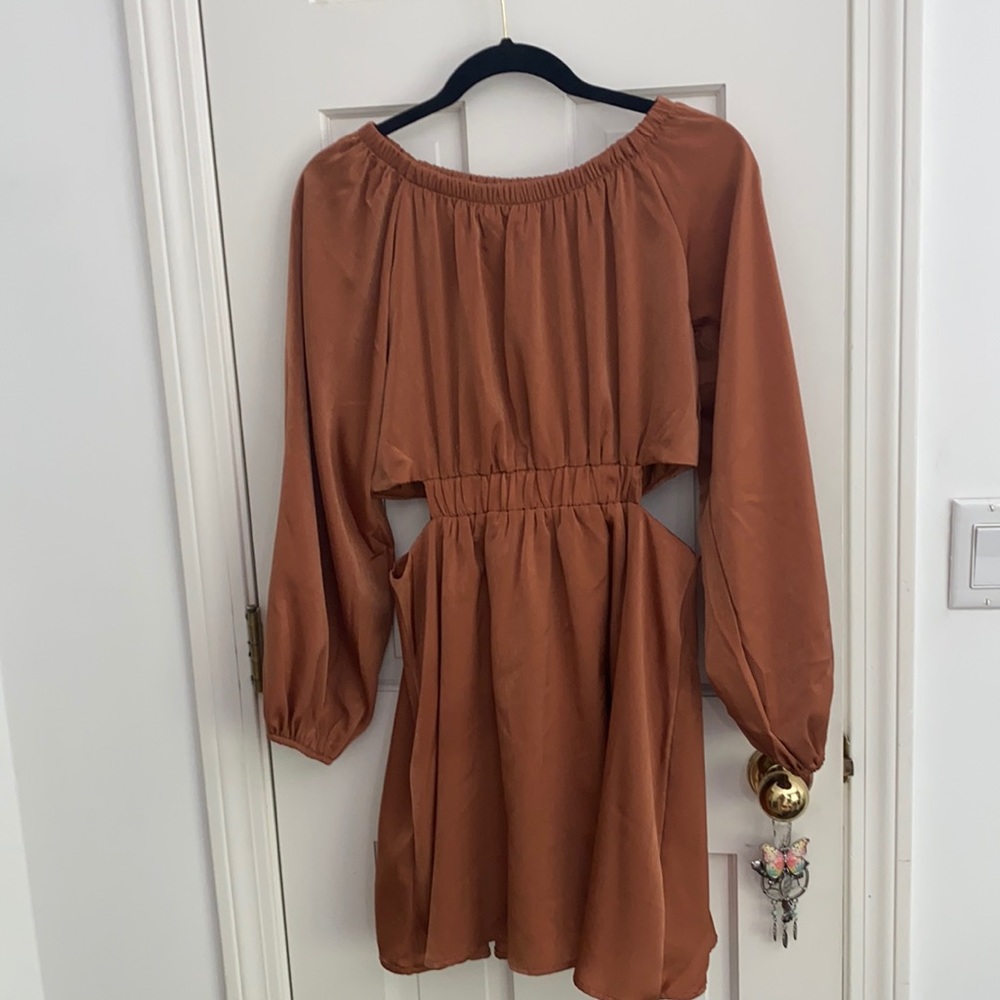 Dress with side cut out holes